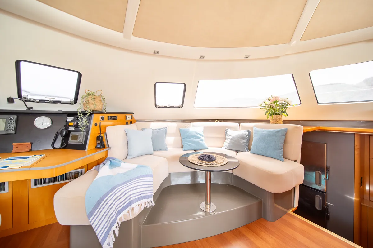 Salon of ZORBA CAT, a Fountaine Pajot Eleuthera 60 catamaran at Aegina, Greece