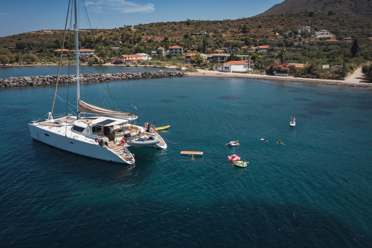 Exterior view of ZORBA CAT, a Fountaine Pajot Eleuthera 60 catamaran at Aegina, Greece