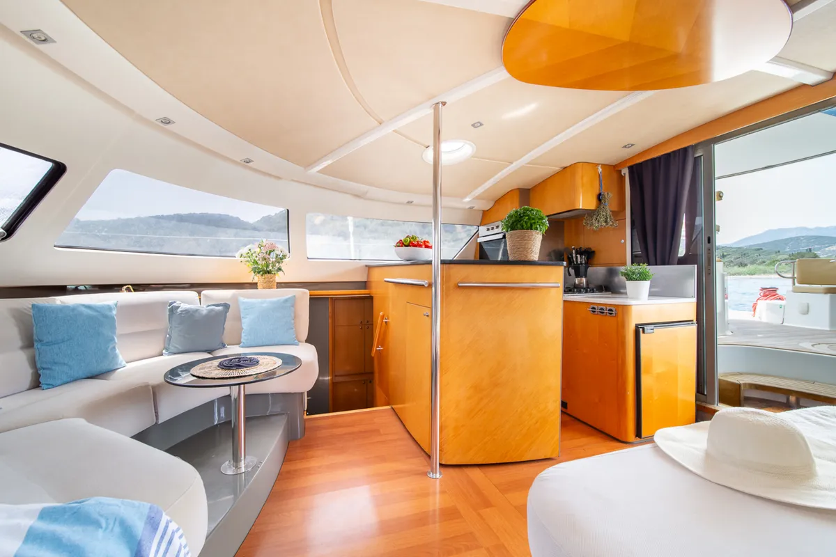 Salon of ZORBA CAT, a Fountaine Pajot Eleuthera 60 catamaran at Aegina, Greece