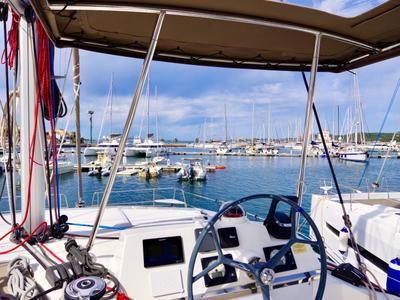 Cockpit of Enya, a Bali 4.1 catamaran at Cannigione, Italy