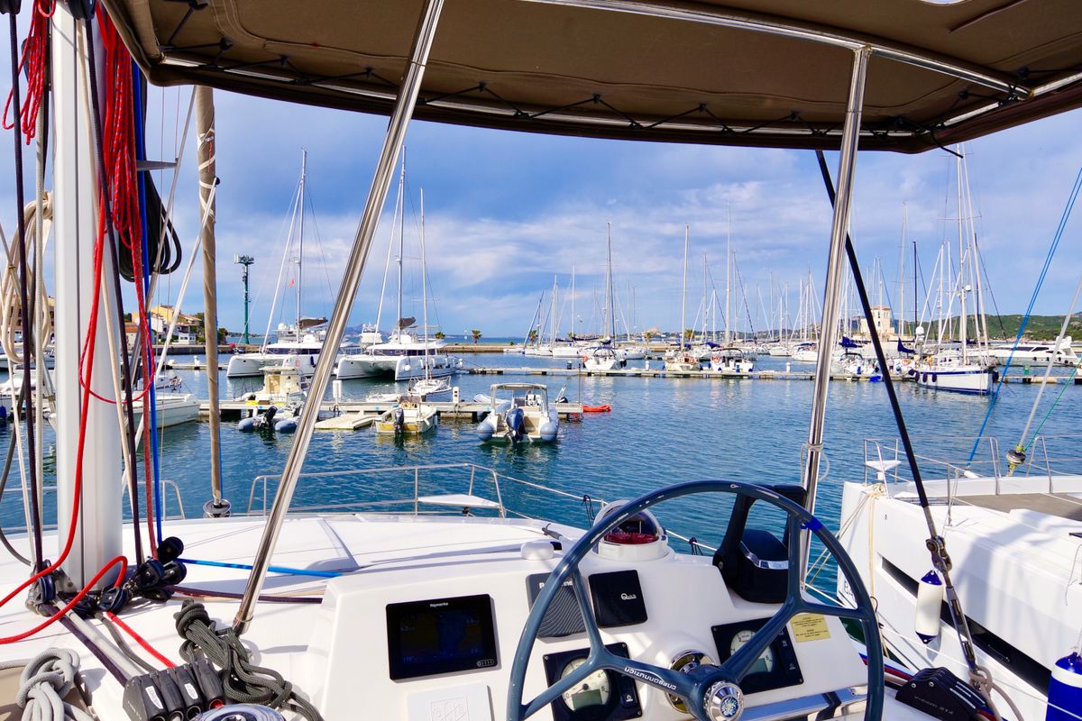 Cockpit of Enya, a Bali 4.1 catamaran at Cannigione, Italy