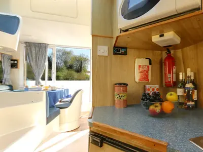 Galley of Caprice - Comfort 29, a Cygnet Caprice motorboat at Fontenoy-le-Château, France