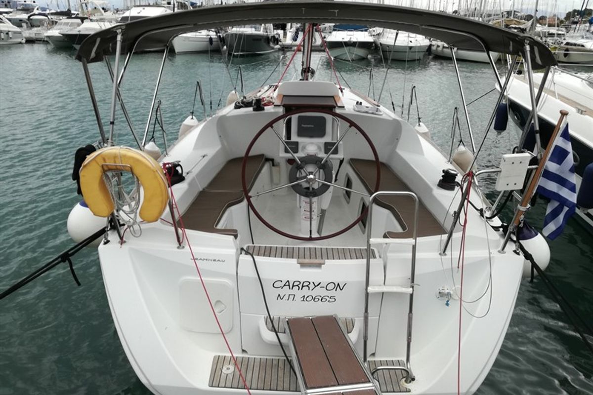 Cockpit of Carry On, a Jeanneau Sun Odyssey 33i sailboat at Kontokali, Greece