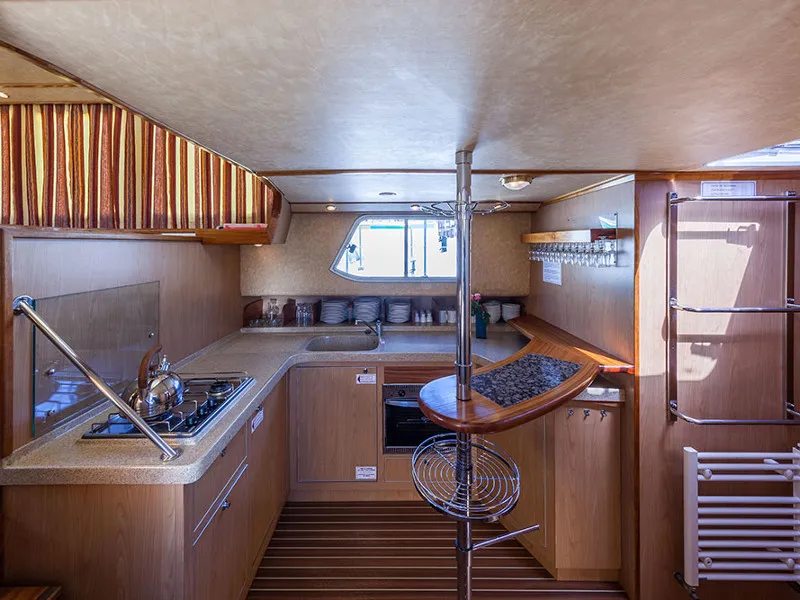 Galley of 150FB-4, a Pénichette 1500FB motorboat at Argens-Minervois, France
