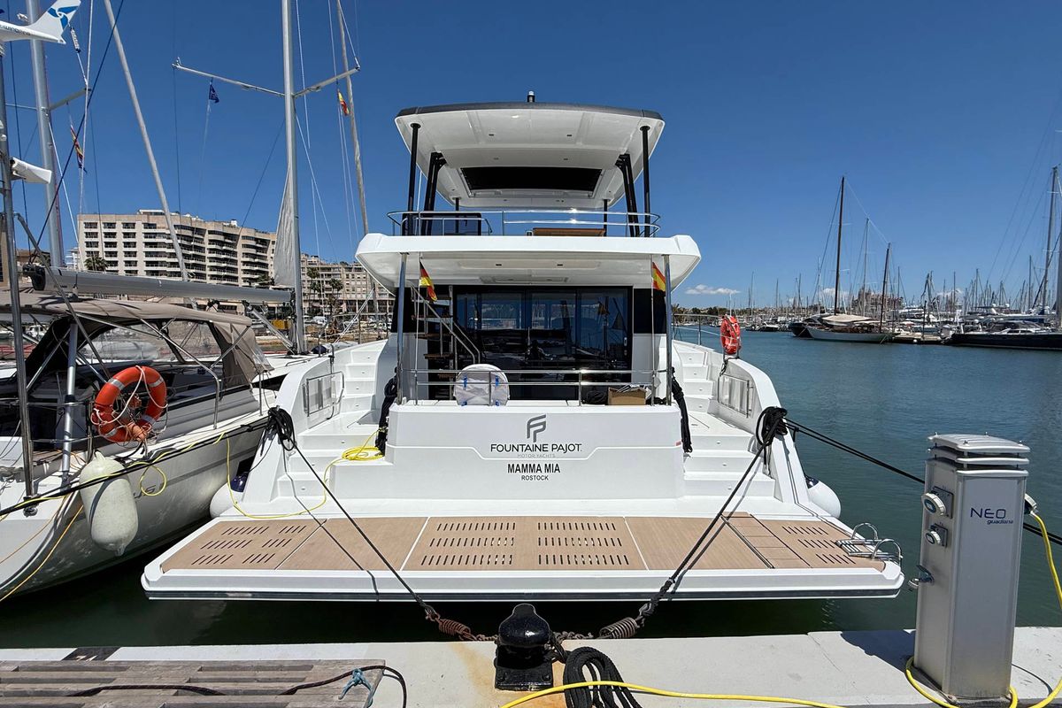 Exterior view of Mamma Mia, a Fountaine Pajot MY6 catamaran at Palma de Mallorca, Spain