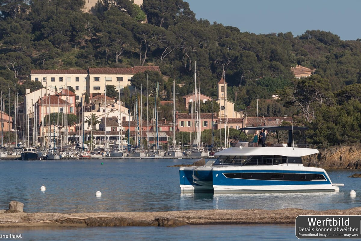 Exterior view of Mamma Mia, a Fountaine Pajot MY6 catamaran at Palma de Mallorca, Spain