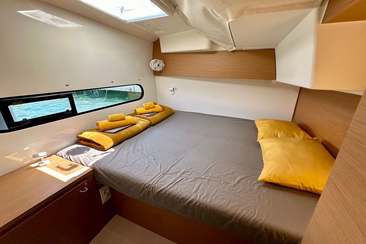 Cabin on KAZBEGI , a Excess 11 catamaran at Port de Pollença, Spain