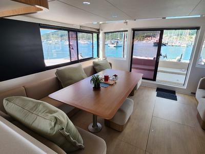 Salon of Four C'S, a Bali 5.8 catamaran at Hyères, France