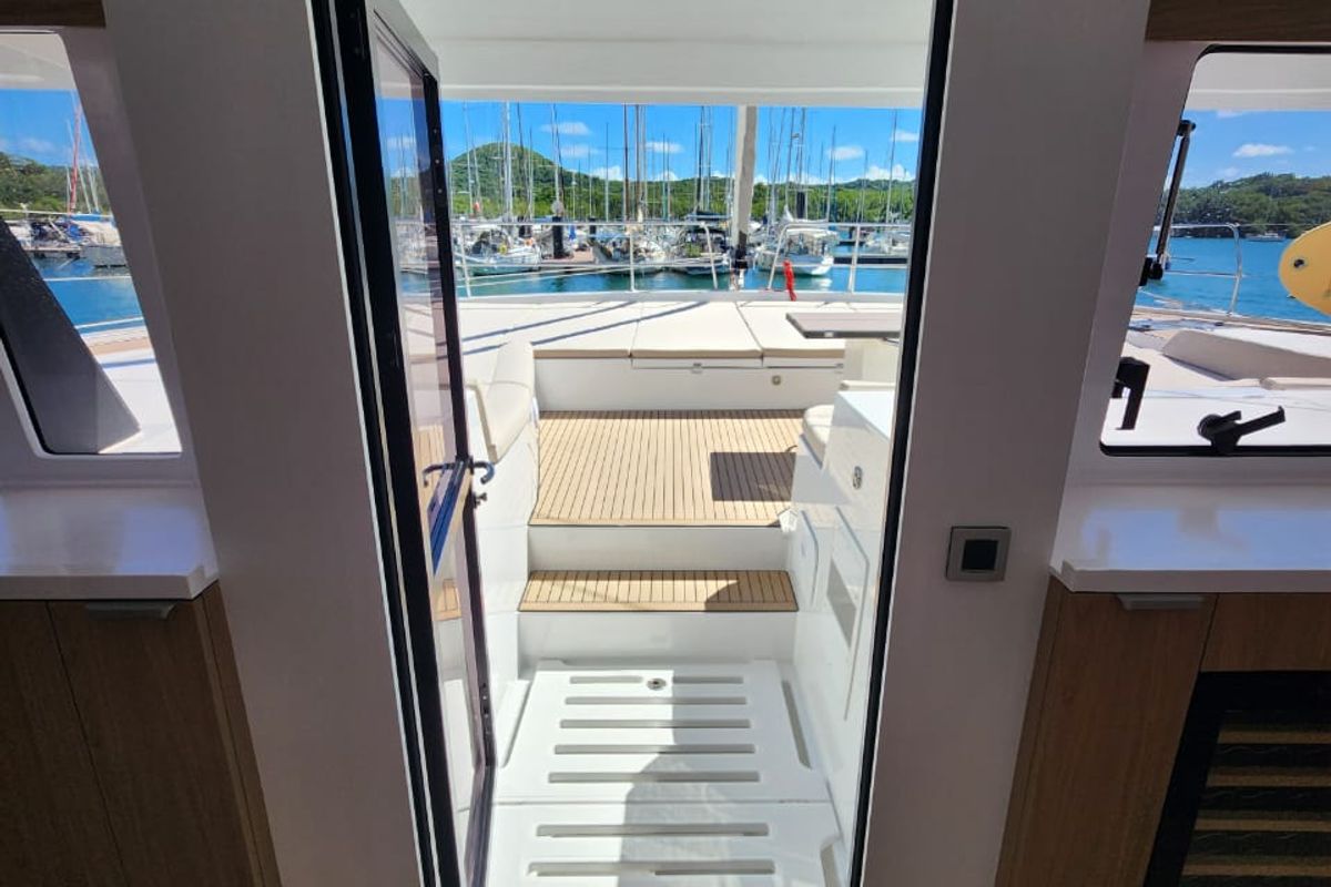 Salon of Four C'S, a Bali 5.8 catamaran at Hyères, France
