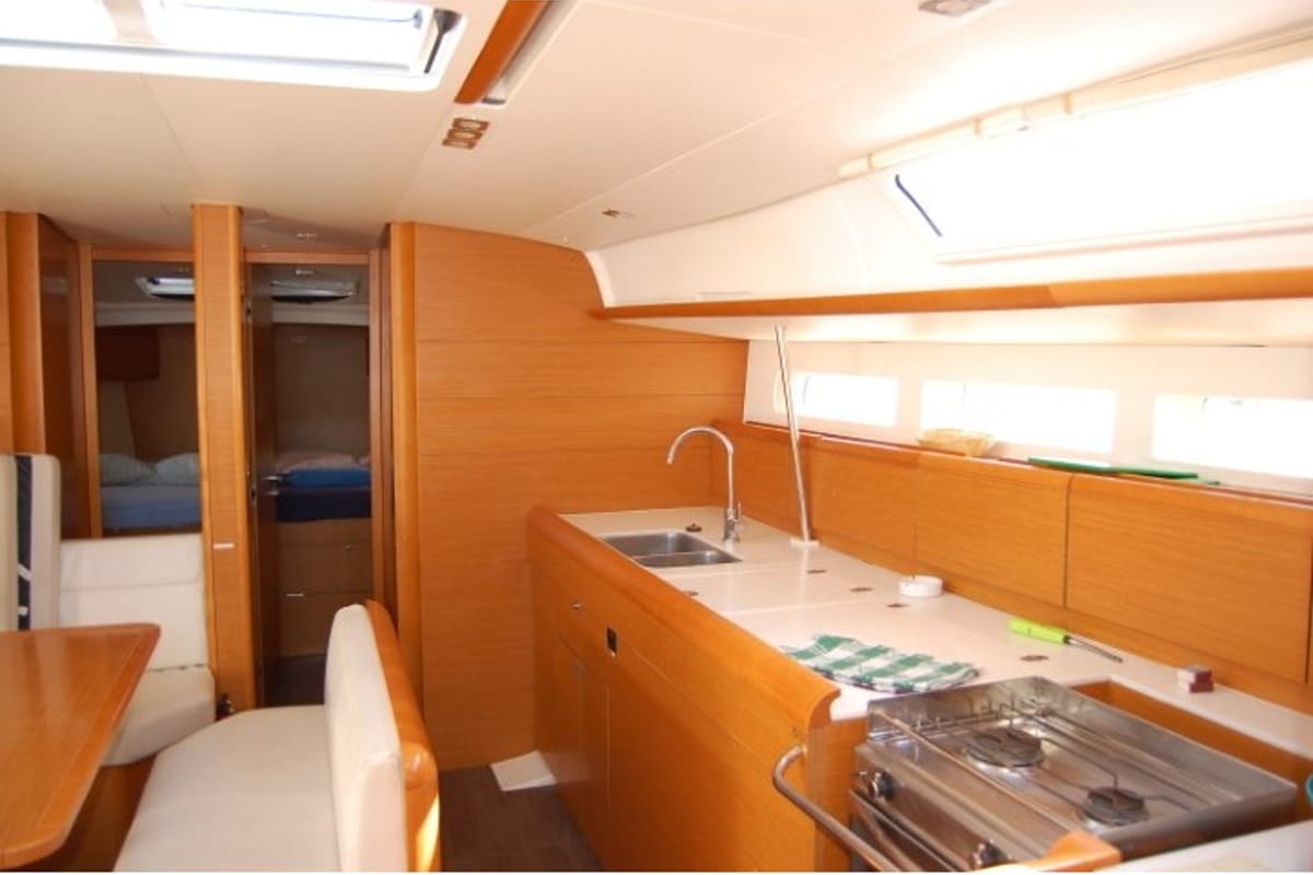 Galley of Alboran Champagne (Mallorca), a Jeanneau Sun Odyssey 519 sailboat at es Jonquet, Spain