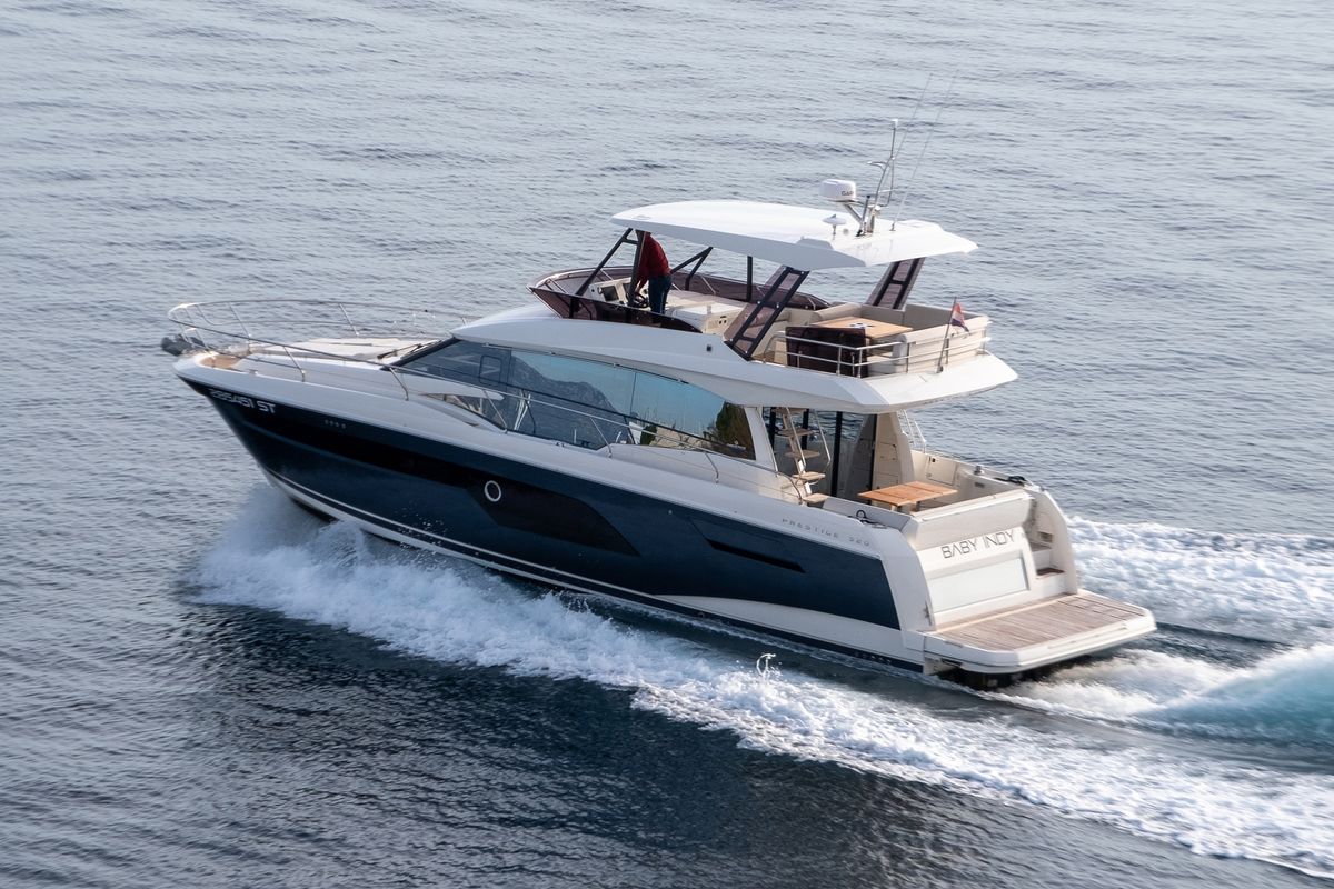 Exterior view of Baby Indy, a Jeanneau Prestige 520 Flybridge yacht at Split, Croatia