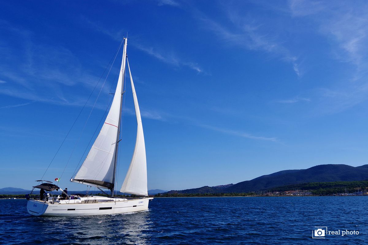 Exterior view of Stella, a Dufour 520 Grand Large sailboat at Puntone di Scarlino, Italy