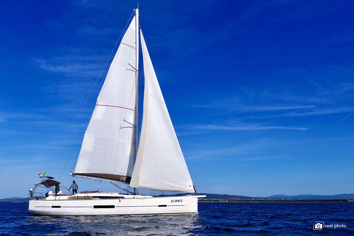 Exterior view of Stella, a Dufour 520 Grand Large sailboat at Puntone di Scarlino, Italy