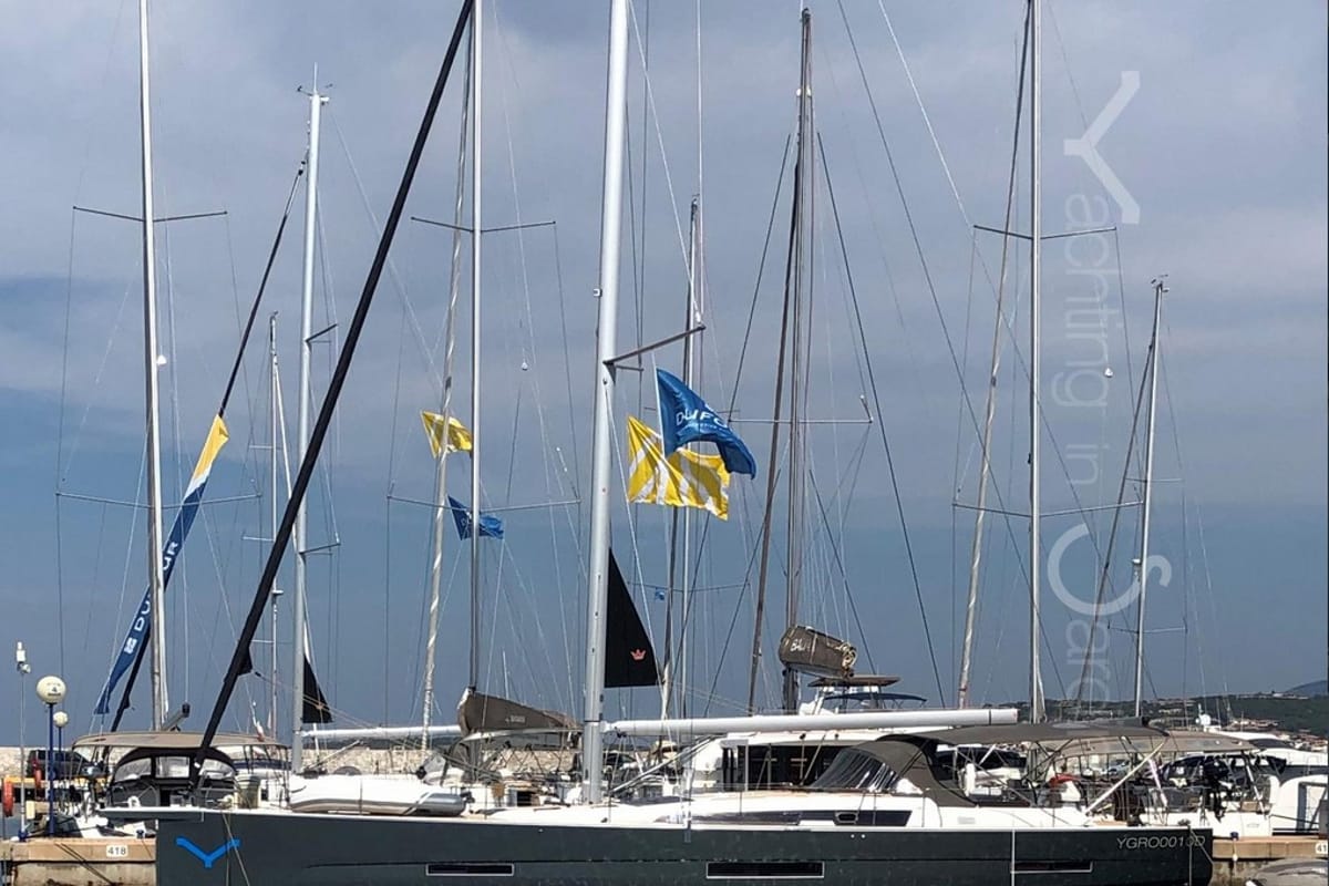 Exterior view of Silente, a Dufour 56 Exclusive sailboat at Olbia, Italy