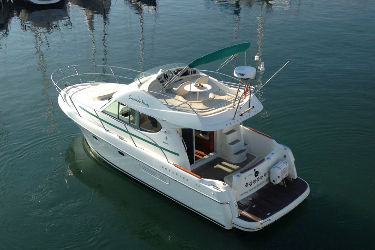 Exterior view of Kazan I, a Prestige 32 motorboat at Sitges, Spain