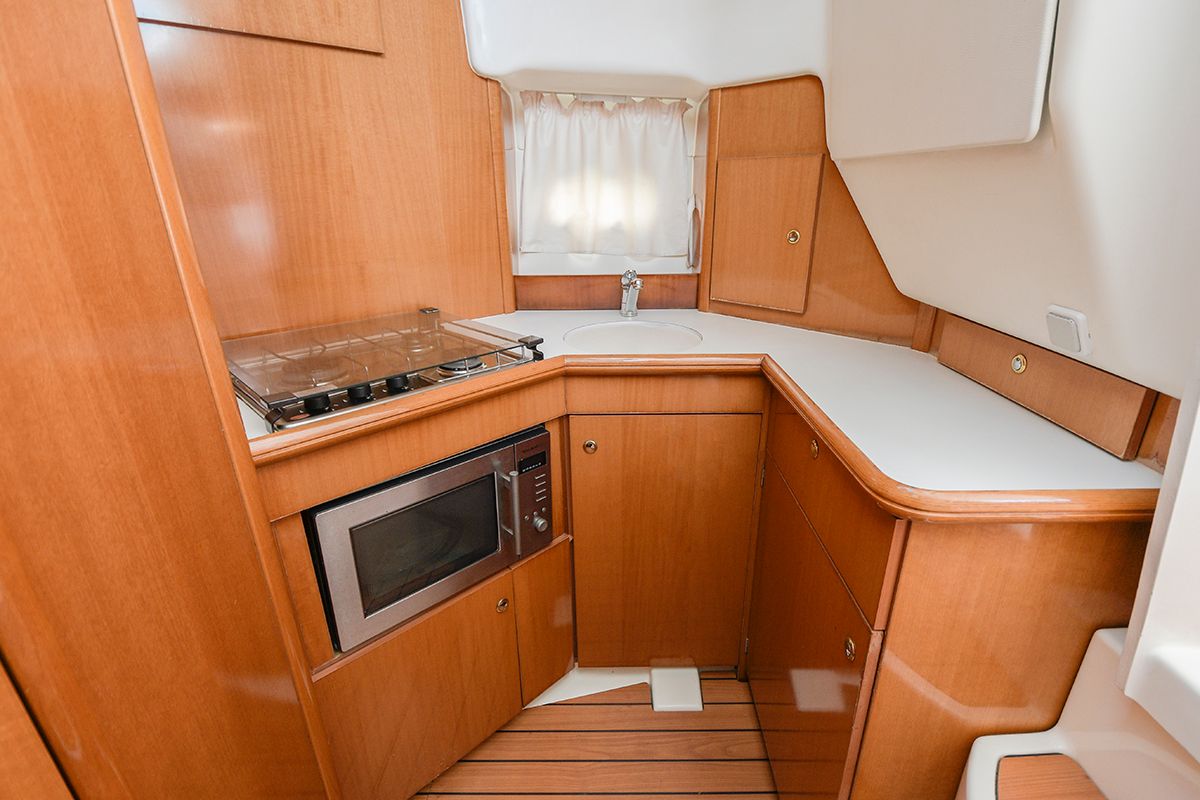 Galley of Kazan I, a Prestige 32 motorboat at Sitges, Spain