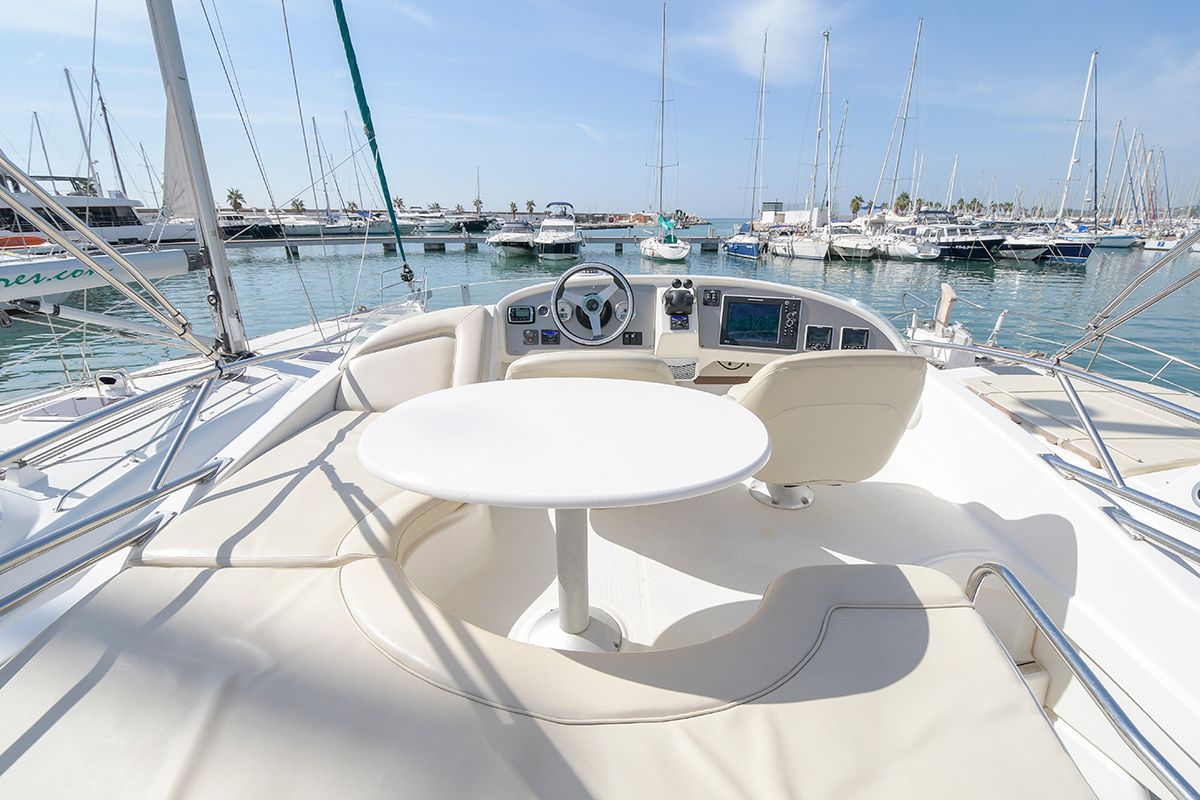 Cockpit of Kazan I, a Prestige 32 motorboat at Sitges, Spain