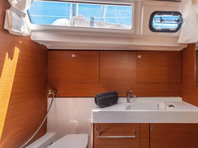 Head on Montecarlo, a Jeanneau Sun Odyssey 519 sailboat at Capo d'Orlando, Italy