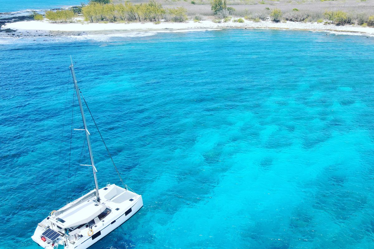 Exterior view of Sea Spirit II, a Nautitech 46 Fly catamaran at Grande Rivière Noire VCA, Mauritius