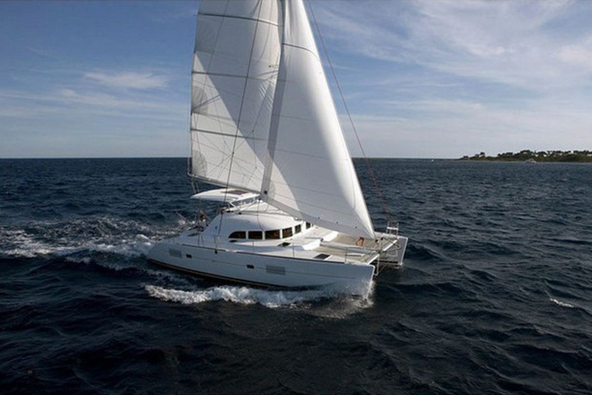 Exterior view of Kiss, a Lagoon 380 S2 catamaran at Nettuno, Italy