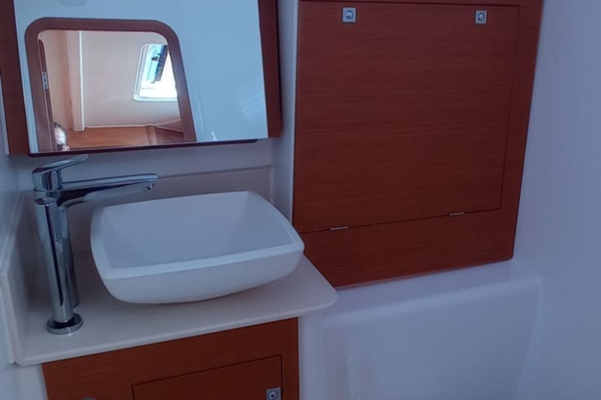 Head on Tiche, a Dufour 390 Grand Large sailboat at Palermo, Italy
