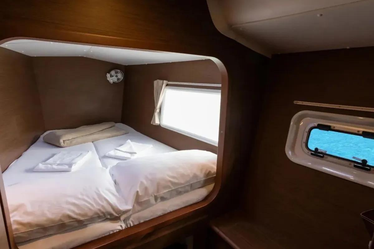 Cabin on Ploto, a Lagoon 380 catamaran at Vibo Valentia, Italy