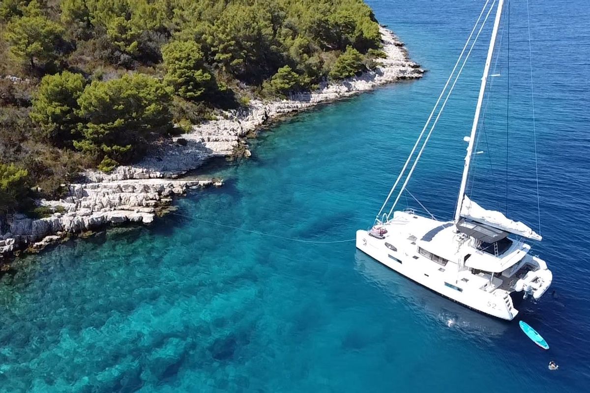 Exterior view of Discovery I, a Lagoon 52F catamaran at Općina Marina, Croatia