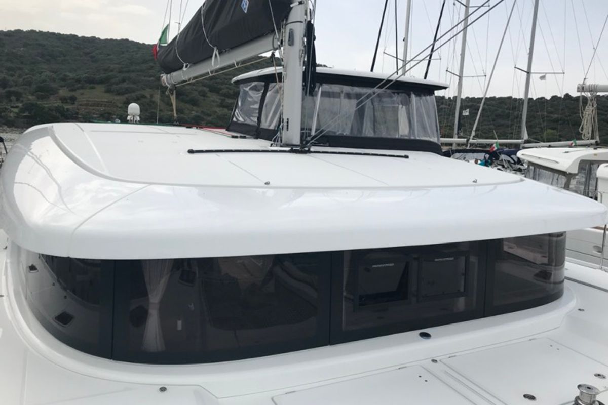 Exterior view of Sammy, a Lagoon 42 catamaran at Olbia, Italy