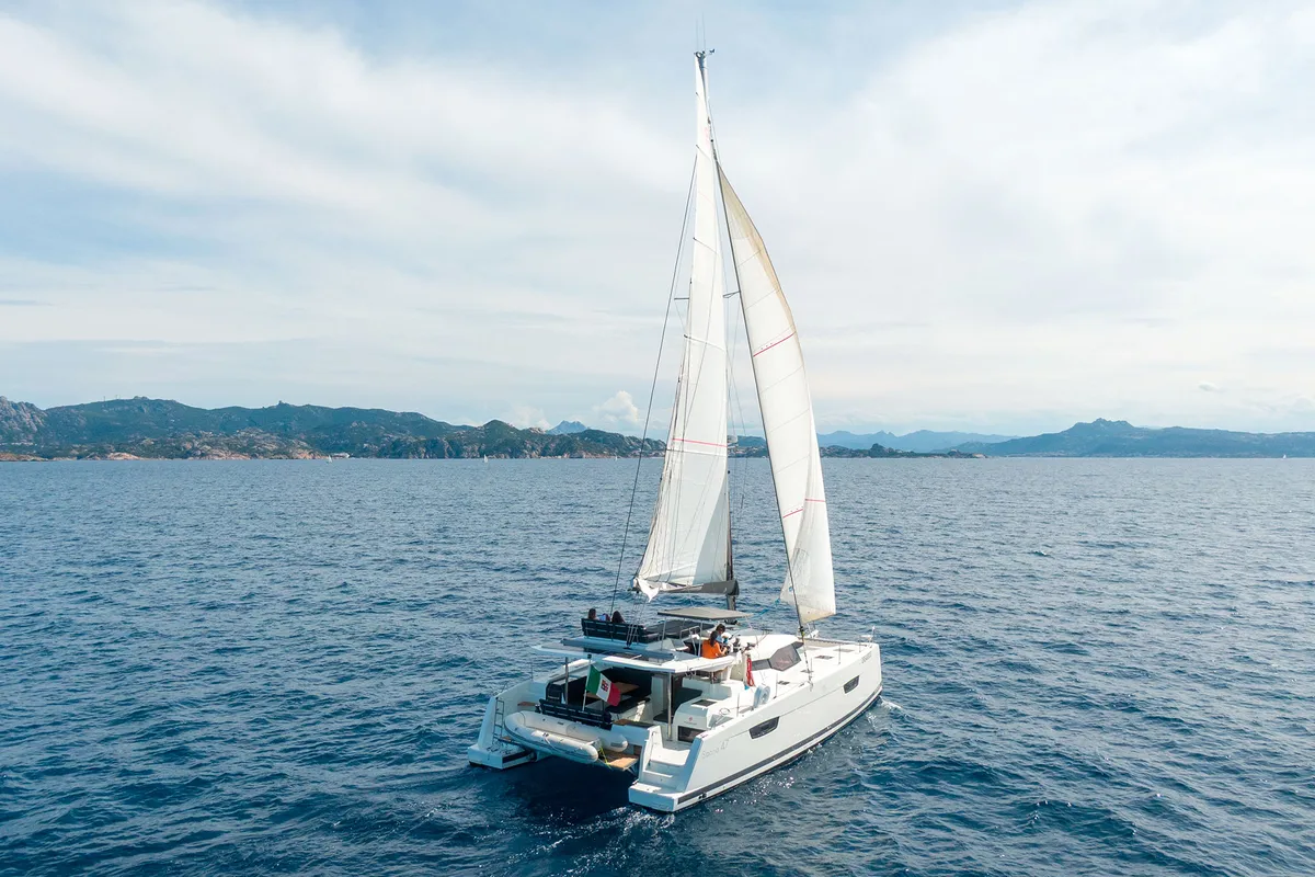Exterior view of Orsa 3, a Fountaine Pajot Saona 47 catamaran at Cannigione, Italy