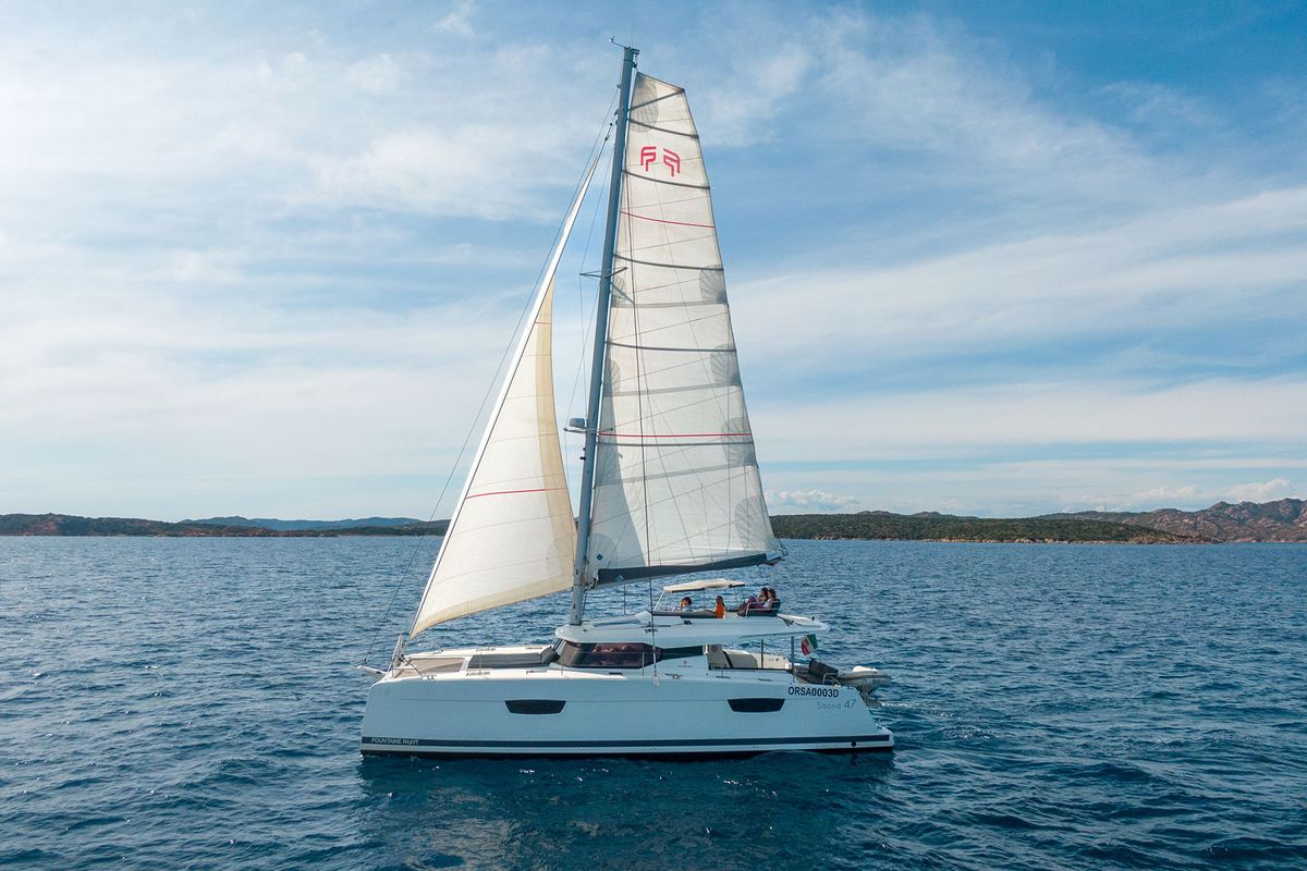 Exterior view of Orsa 3, a Fountaine Pajot Saona 47 catamaran at Cannigione, Italy