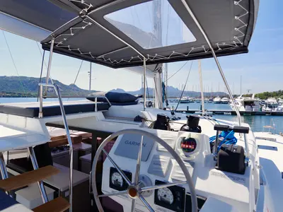 Cockpit of Orsa 3, a Fountaine Pajot Saona 47 catamaran at Cannigione, Italy