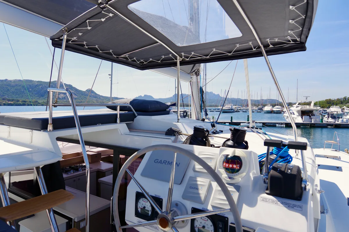 Cockpit of Orsa 3, a Fountaine Pajot Saona 47 catamaran at Cannigione, Italy