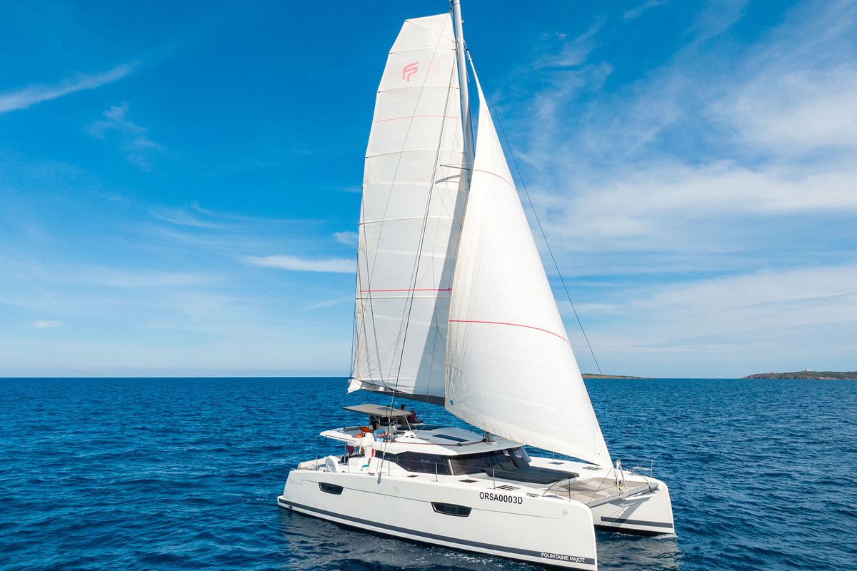 Exterior view of Orsa 3, a Fountaine Pajot Saona 47 catamaran at Cannigione, Italy