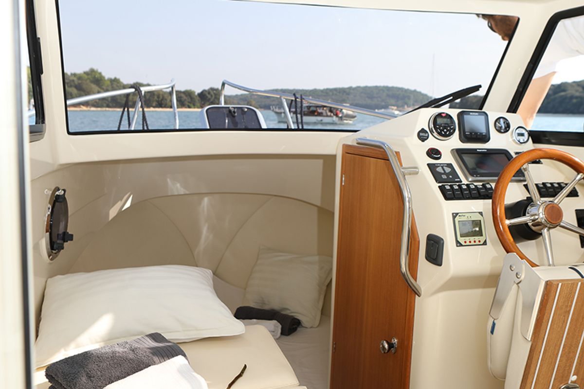 Cockpit of H2, a Leidi 660 motorboat at Grad Pula, Croatia