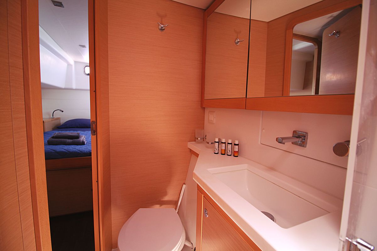 Head on Poker Face  - (A/C - Generator - Refit 2021), a Lagoon 450 Fly catamaran at Athens, Greece