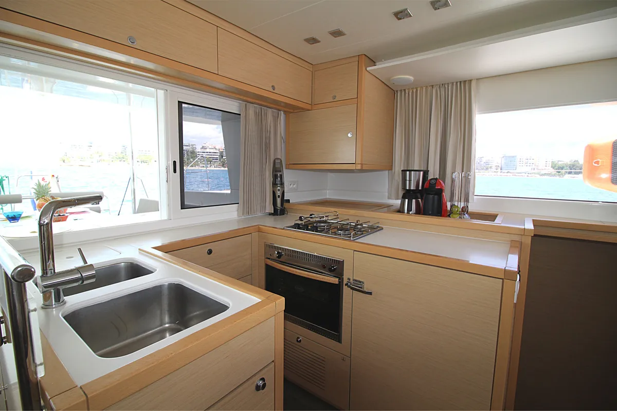 Galley of Poker Face  - (A/C - Generator - Refit 2021), a Lagoon 450 Fly catamaran at Athens, Greece
