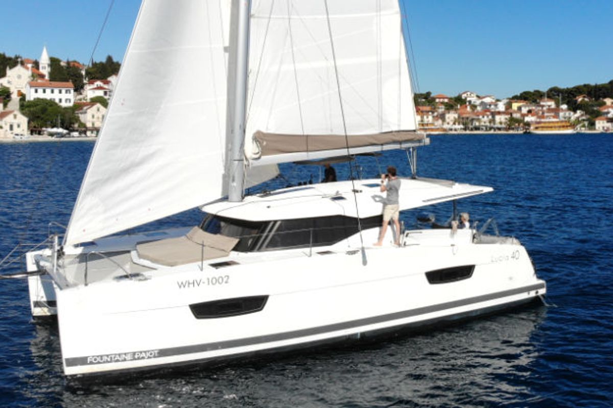 Exterior view of Leon, a Fountaine Pajot Lucia 40 catamaran at Općina Rogoznica, Croatia