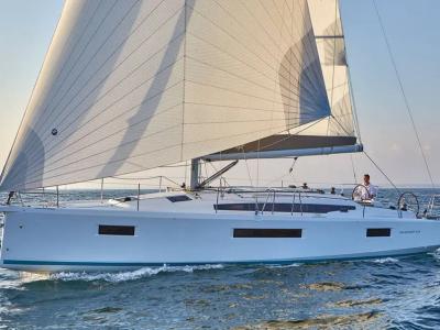 Exterior view of JIMMY, a Jeanneau Sun Odyssey 410 sailboat at La Favière, France