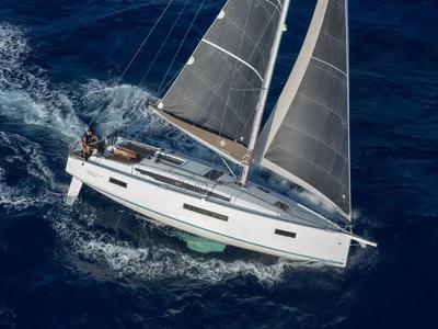 Exterior view of JIMMY, a Jeanneau Sun Odyssey 410 sailboat at La Favière, France