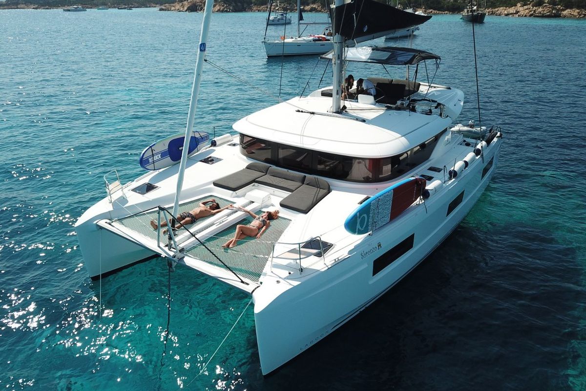 Exterior view of Sbronzo, a Lagoon 46 catamaran at Olbia, Italy
