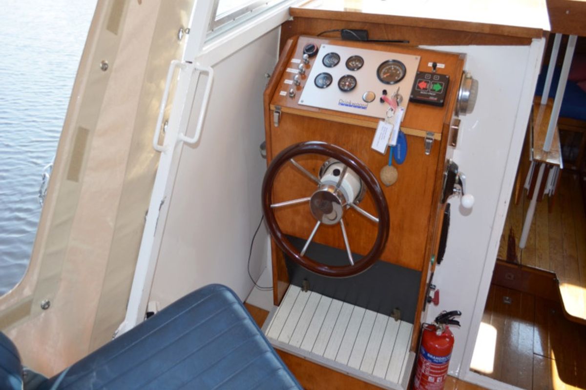 Cockpit of Woelwater, a De Drait Doerak 850 OK motorboat at Drachten, Netherlands