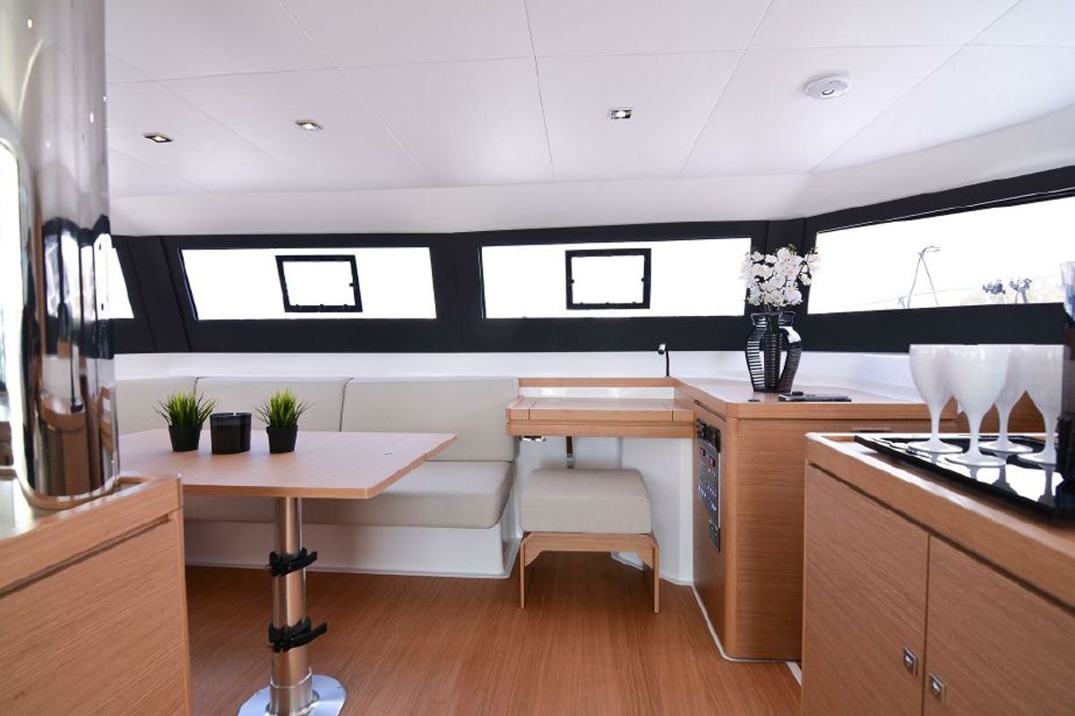 Salon of Jovy, a Dufour Catamaran 48 catamaran at Capo d'Orlando, Italy