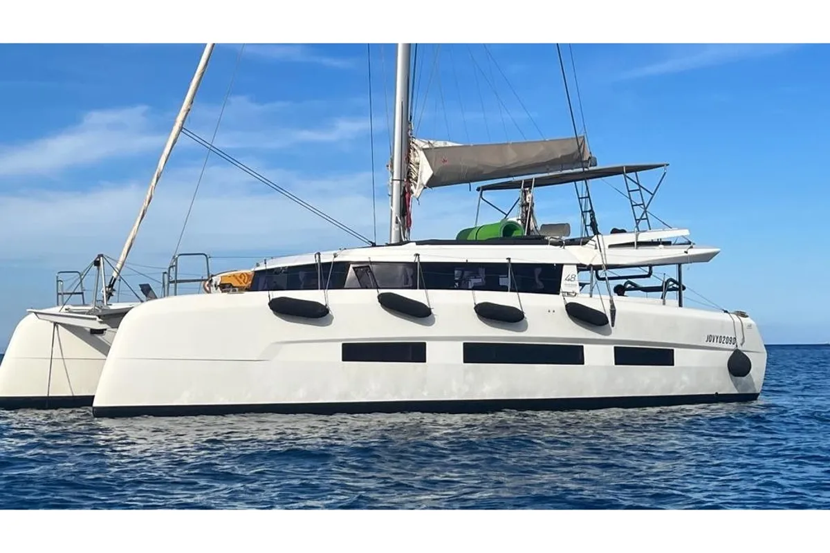 Exterior view of Jovy, a Dufour Catamaran 48 catamaran at Capo d'Orlando, Italy