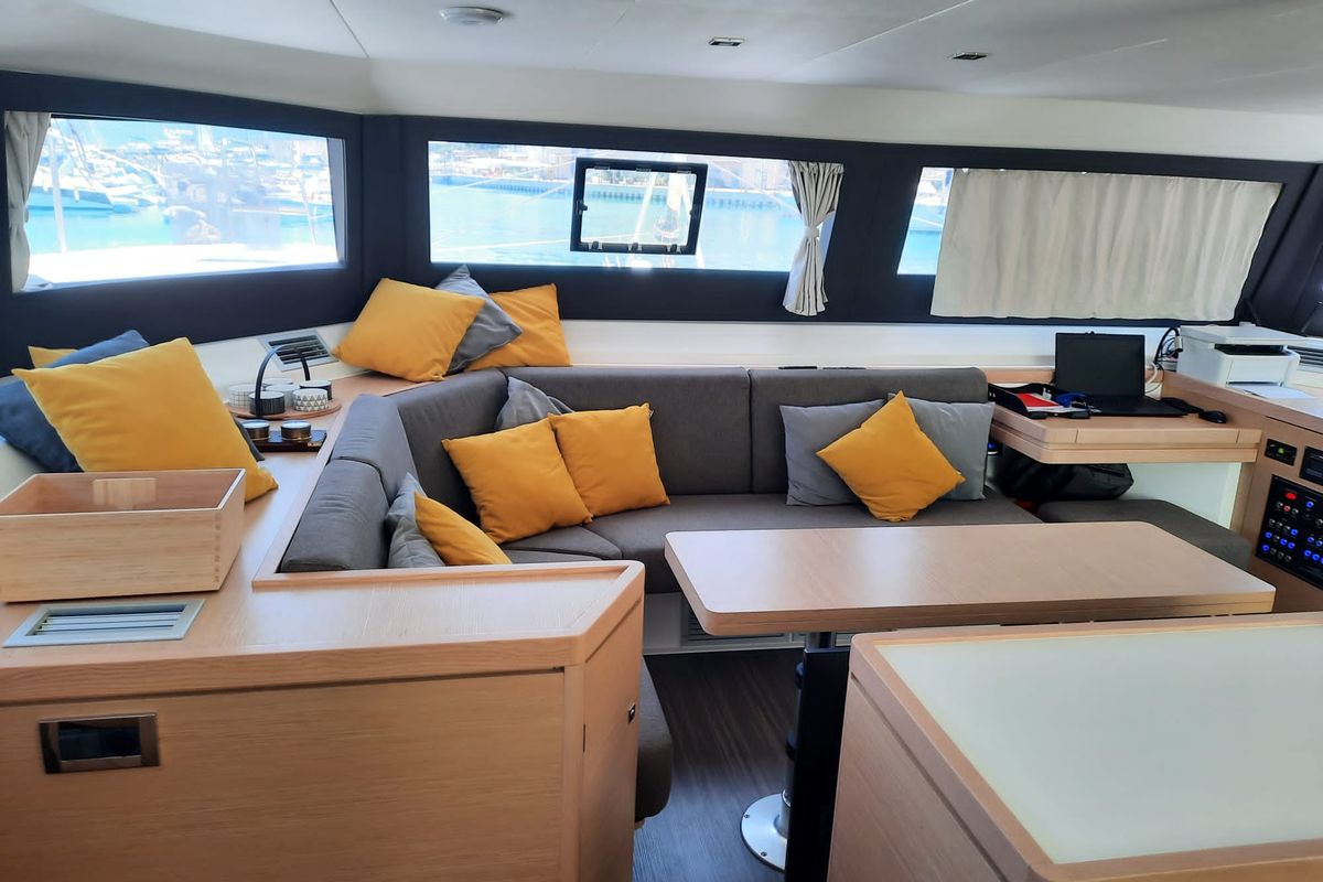 Salon of Jovy, a Dufour Catamaran 48 catamaran at Capo d'Orlando, Italy