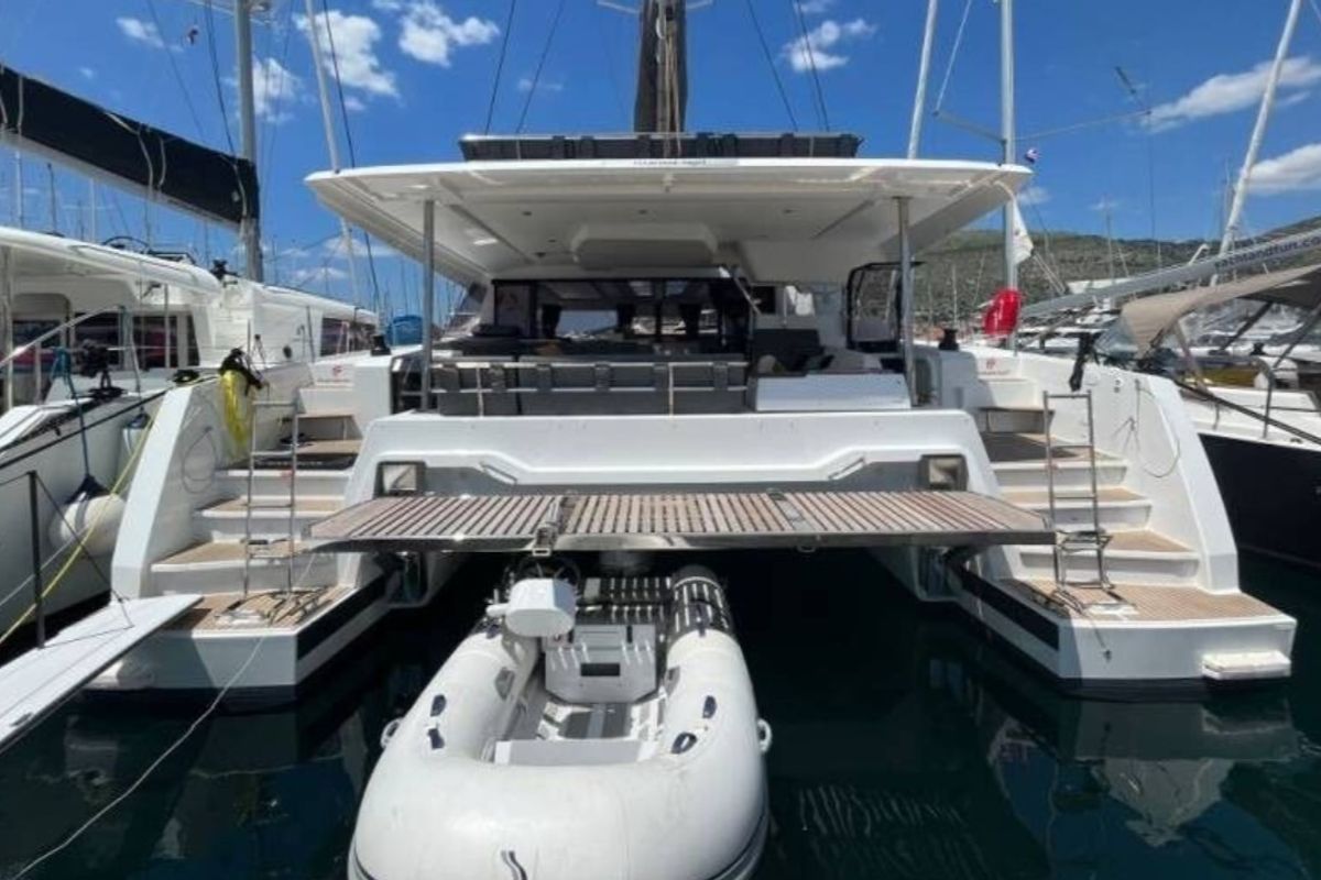 Exterior view of All Blue IV, a Fountaine Pajot Aura 51 catamaran at Athens, Greece