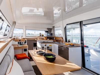Salon of Elyvian Spirit, a Excess 11 catamaran at Taranto, Italy