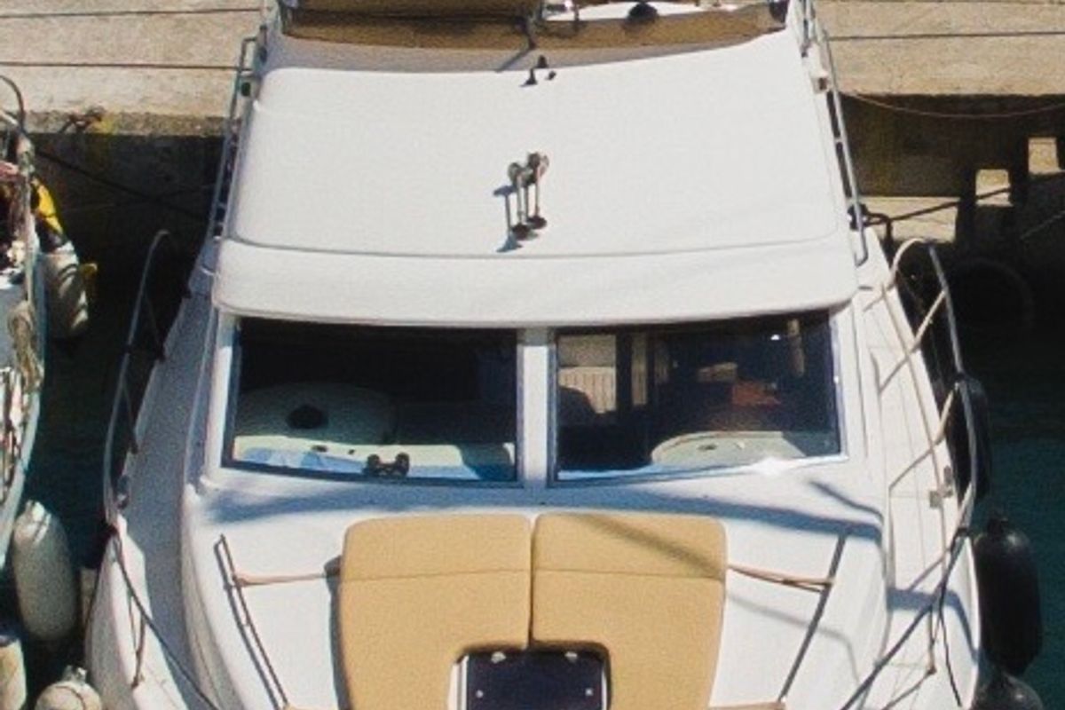 Exterior view of Constantin 2, a Princess Yachts Princess 38 motorboat at Parikia, Greece
