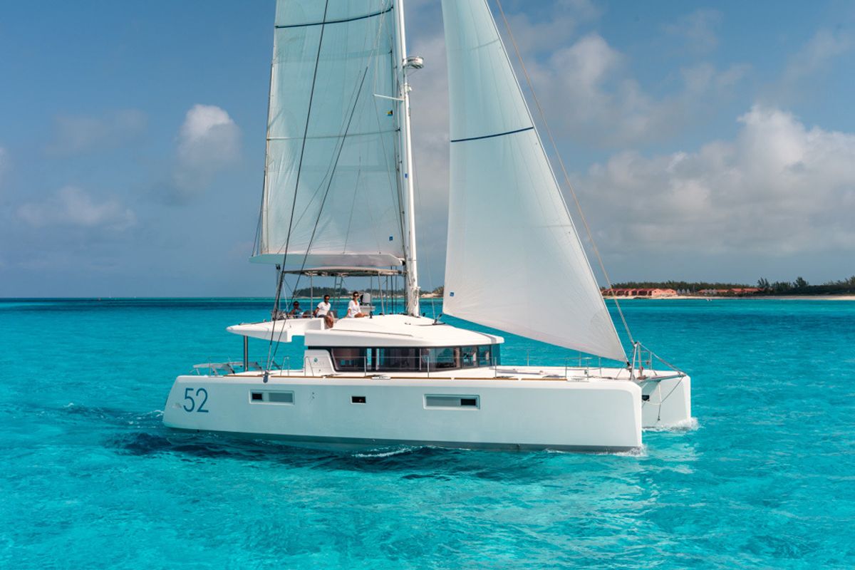 Exterior view of Madinina, a Lagoon 52 F catamaran at Lavreotiki Municipal Unit, Greece