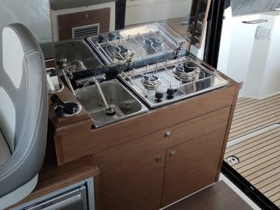 Galley of Gloria, a Jeanneau Merry Fisher 895 motorboat at Bacoli, Italy