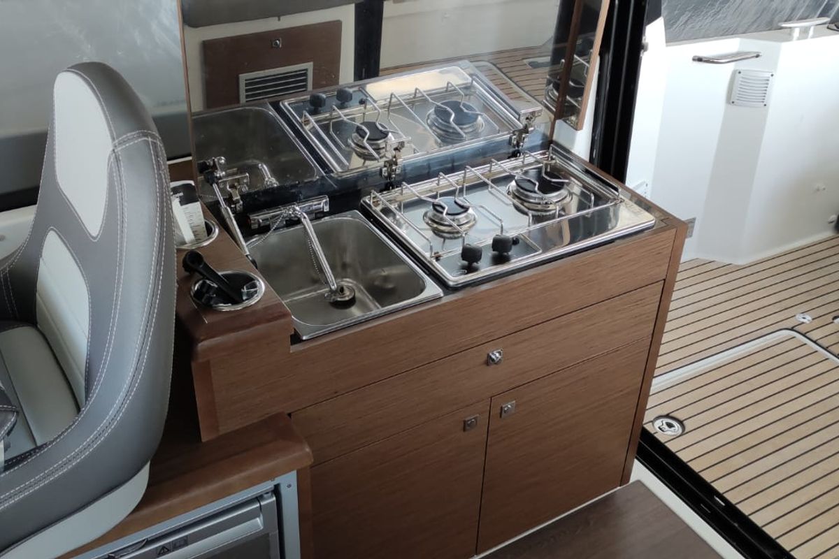 Galley of Gloria, a Jeanneau Merry Fisher 895 motorboat at Bacoli, Italy